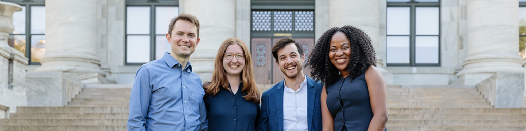 2024-25 fellows standing in front of Gordon Hall